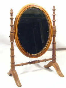 Appraisal: A Victorian dressing table swing mirror