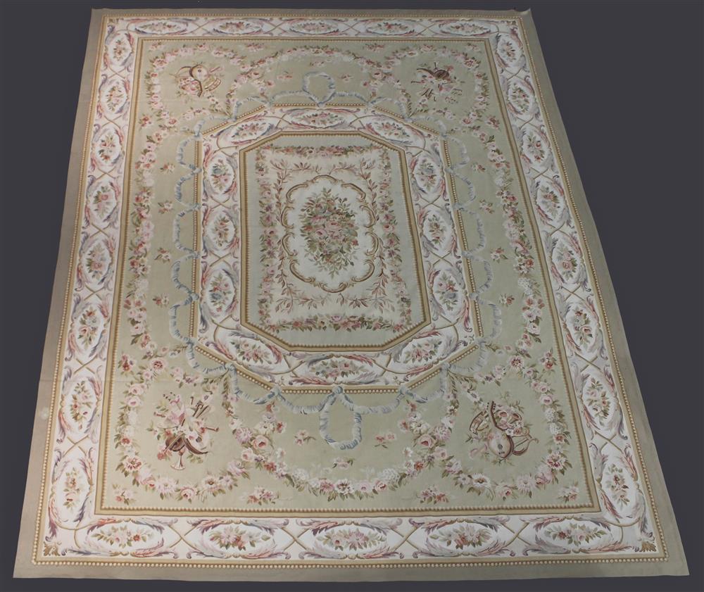 Appraisal: LARGE CHINESE AUBUSSON WOOL RUG flatwoven having a floral spray