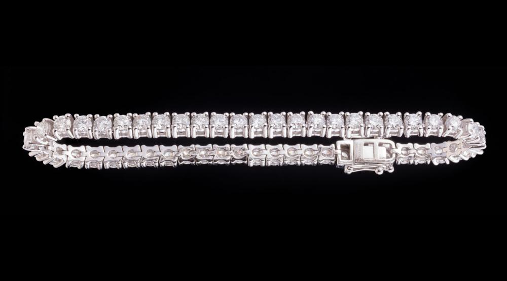 Appraisal: Platinum and Diamond Tennis Bracelet prong set round brilliant cut