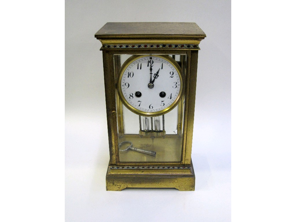 Appraisal: Brass mantle clock with rectangular four glass case decorated with