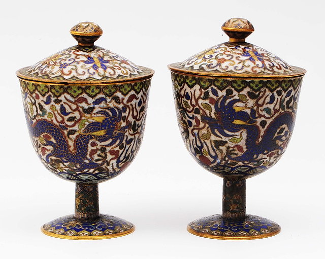 Appraisal: A pair of Chinese cloisonne cups and covers th Centuryeach