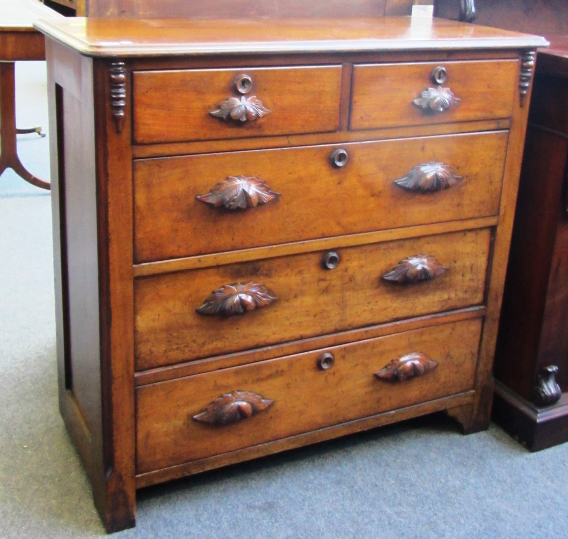 Appraisal: A late th century mahogany chest of two short and