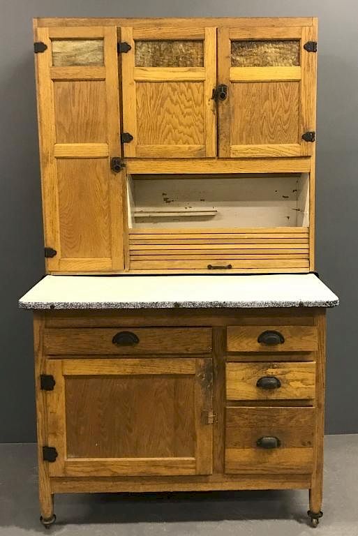 Appraisal: Oak Two-Part Hoosier Cabinet Oak two-part Hoosier cabinet with porcelain