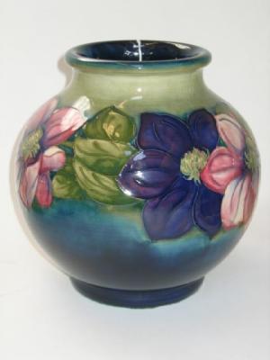 Appraisal: A MOORCROFT POTTERY VASE of globular form tube lined in