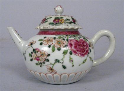 Appraisal: Chinese chrysanthemum molded famille rose porcelain teapot yongzheng period The