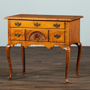 Appraisal: A Queen Anne Style Fan Carved Tiger Maple Dressing Table