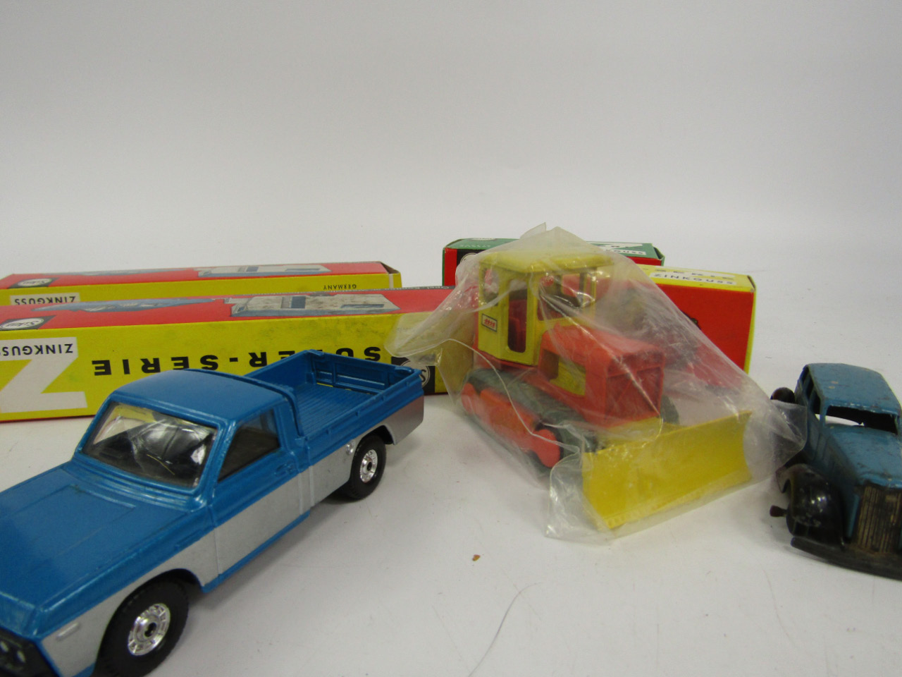 Appraisal: Four die cast Siku vehicles VW camper tractor and two