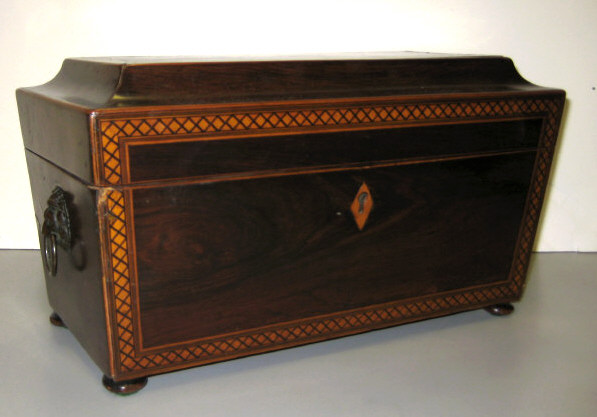 Appraisal: ANTIQUE ENGLISH MAHOGANY TEA CADDY Casket form mahogany with inlay