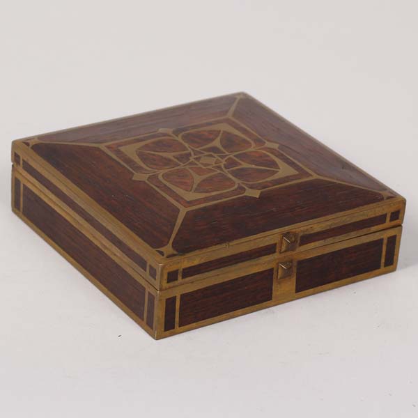 Appraisal: German Secessionist brass inlay and rosewood box with geometric rosette