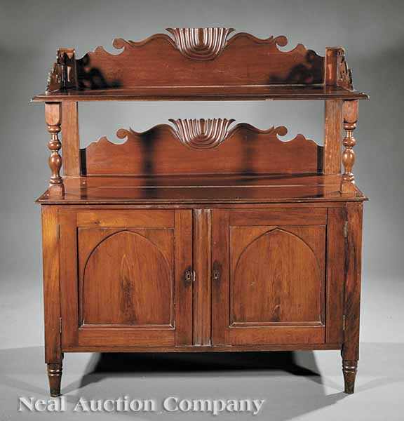 Appraisal: A West Indies Carved Tropical Hardwood Server mid- th c