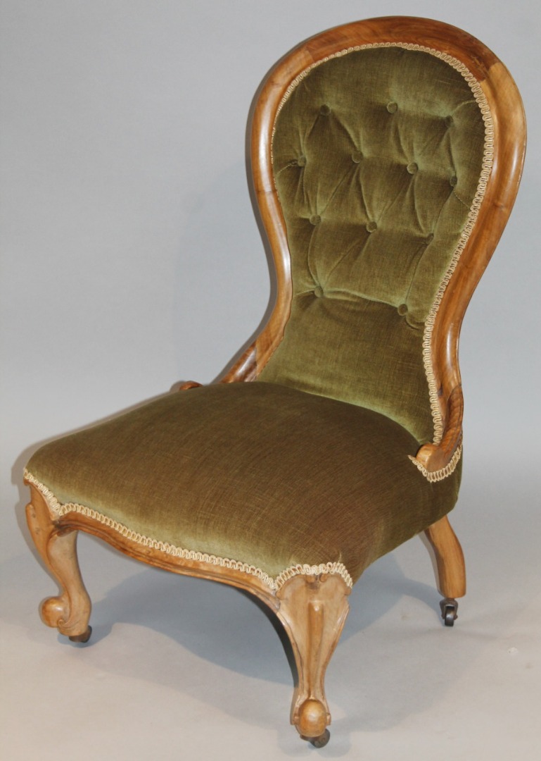 Appraisal: A Victorian walnut framed spoon back chair with a partial