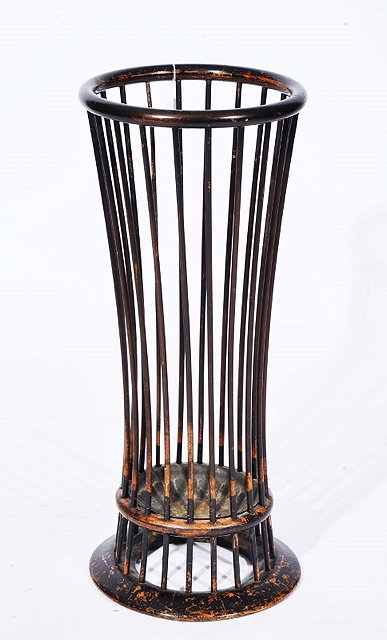 Appraisal: AN EDWARDIAN BENTWOOD STICK UMBRELLA STAND with spindle supports on