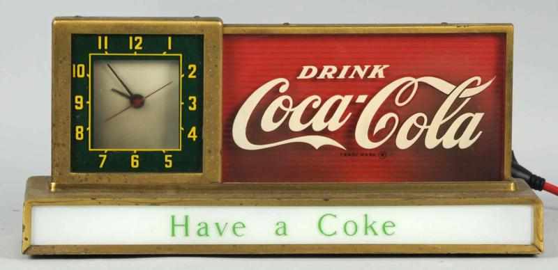 Appraisal: s Coca-Cola Countertop Lighted Sign Clock Runs and lights fine