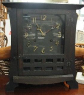 Appraisal: AN AMERICAN MISSION OAK CASED MANTEL CLOCK by The New