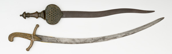 Appraisal: Shamshir with curved blade with single piece cast brass hilt