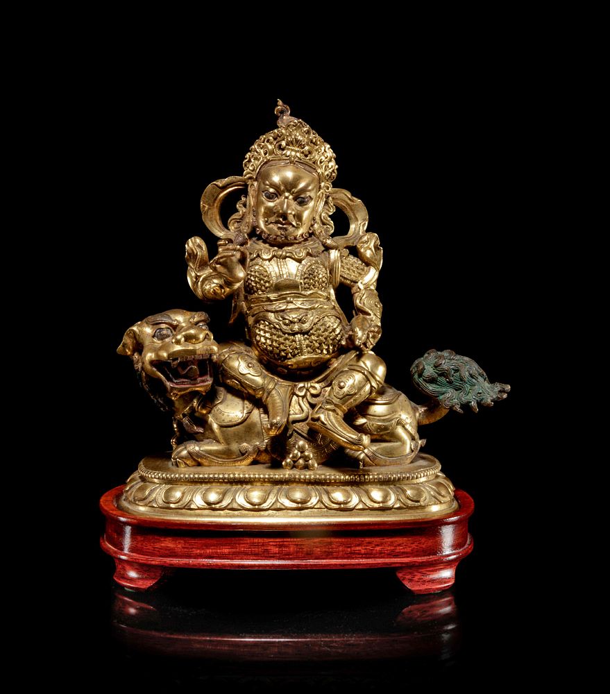 Appraisal: A Sino-Tibetan Gilt Bronze Figure of Bodhisattva Lokapala Vaishravana Height