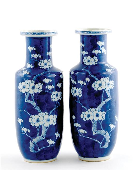 Appraisal: Pair Japanese blue-and-white porcelain vases early th century elongated neck