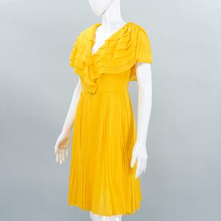 Appraisal: James Galanos yellow chiffon cocktail dress James Galanos yellow chiffon