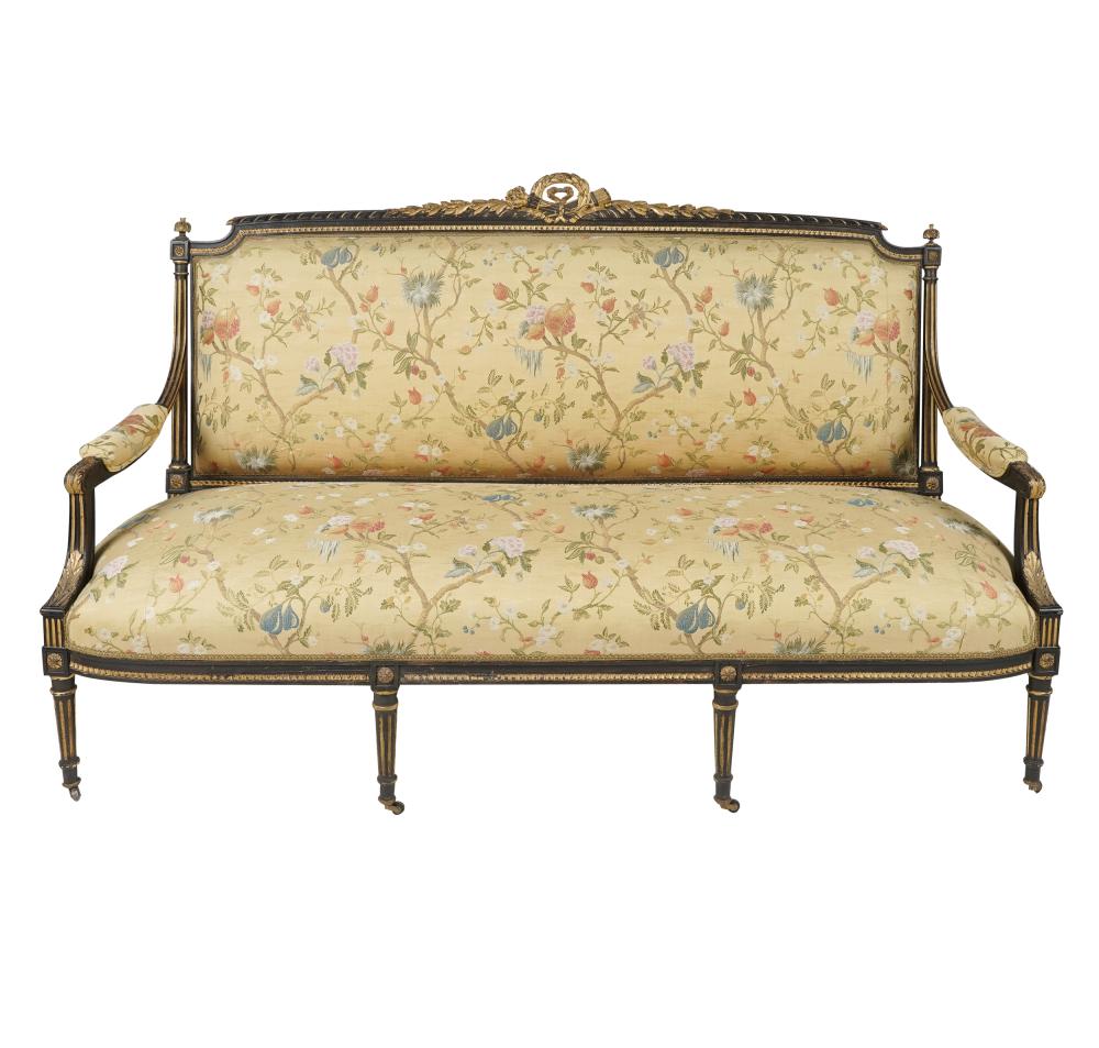 Appraisal: LOUIS XVI-STYLE EBONIZED GILT CANAPEcovered with yellow floral print fabric