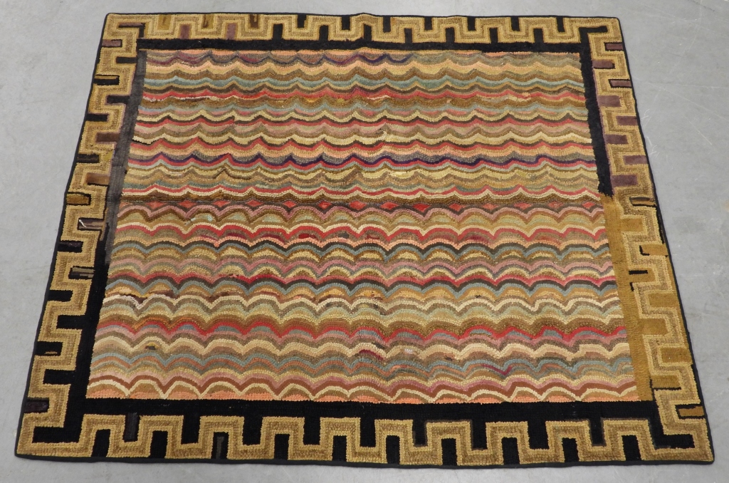 Appraisal: AMERICAN PRIMITIVE RAINBOW WAVE HOOK RUG United States th CenturyPolychromatic