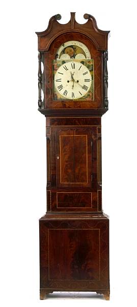 Appraisal: A late Regency inlaid mahogany tall case clock the arched