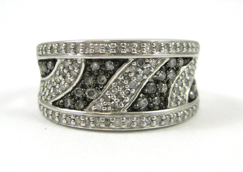 Appraisal: HELZBERG SILVER MIST WHITE DIAMOND RING set with round-cut diamonds