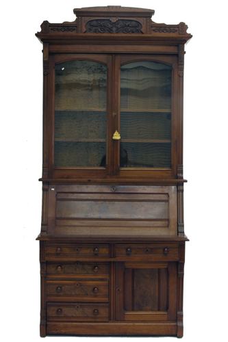 Appraisal: VICTORIAN WALNUT SECRETARY BOOKCASE Eastlake design American c The top