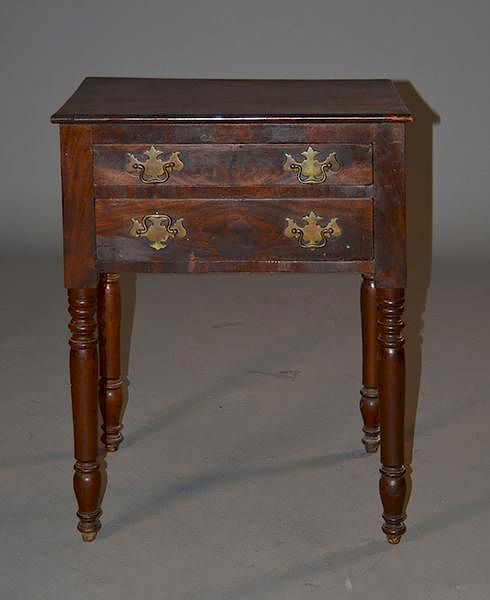 Appraisal: American stained cherry with mahogany veneers two drawer stand American