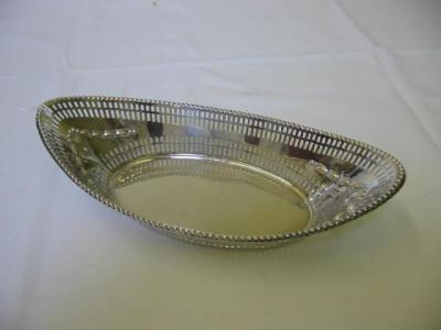 Appraisal: AN EDWARDIAN FRUIT DISH of boat form with beaded rim