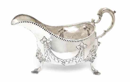 Appraisal: An Irish Silver Gravy Boat Dublin marks rubbed maker likely