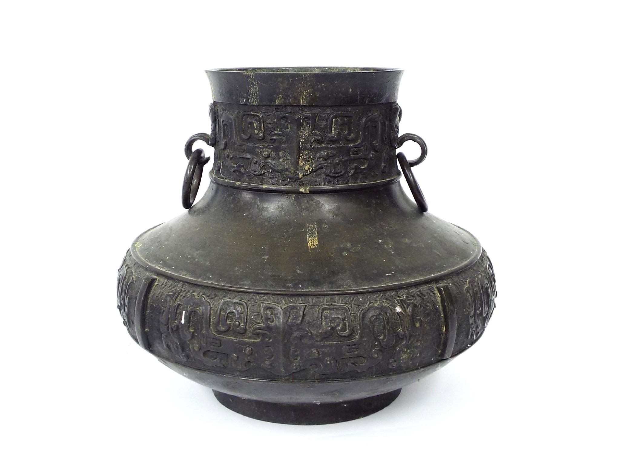 Appraisal: Chinese cast bronze twin handled baluster pot decorated in relief