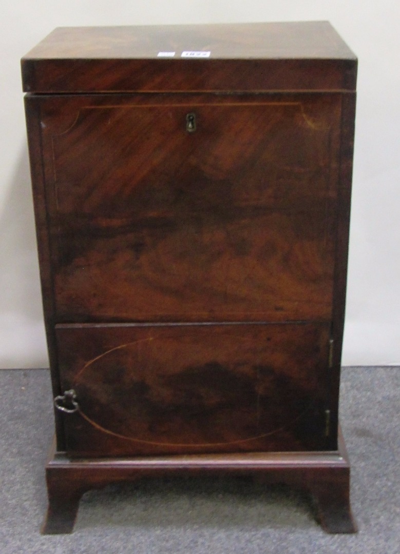 Appraisal: A George III inlaid mahogany cellarette the rectangular lift top