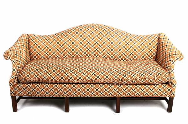 Appraisal: A Chippendale style mahogany and upholstered camelback style sofa height