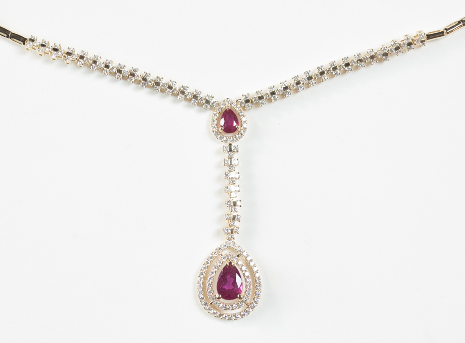 Appraisal: RUBY AND FOURTEEN KARAT GOLD NECKLACE with AGI appraisal The