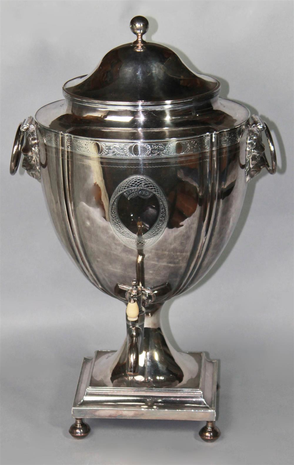 Appraisal: GEORGE III STYLE SILVERPLATED HOT WATER URN the oval domed