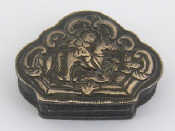 Appraisal: A white metal tests silver shaped triangular snuff box the