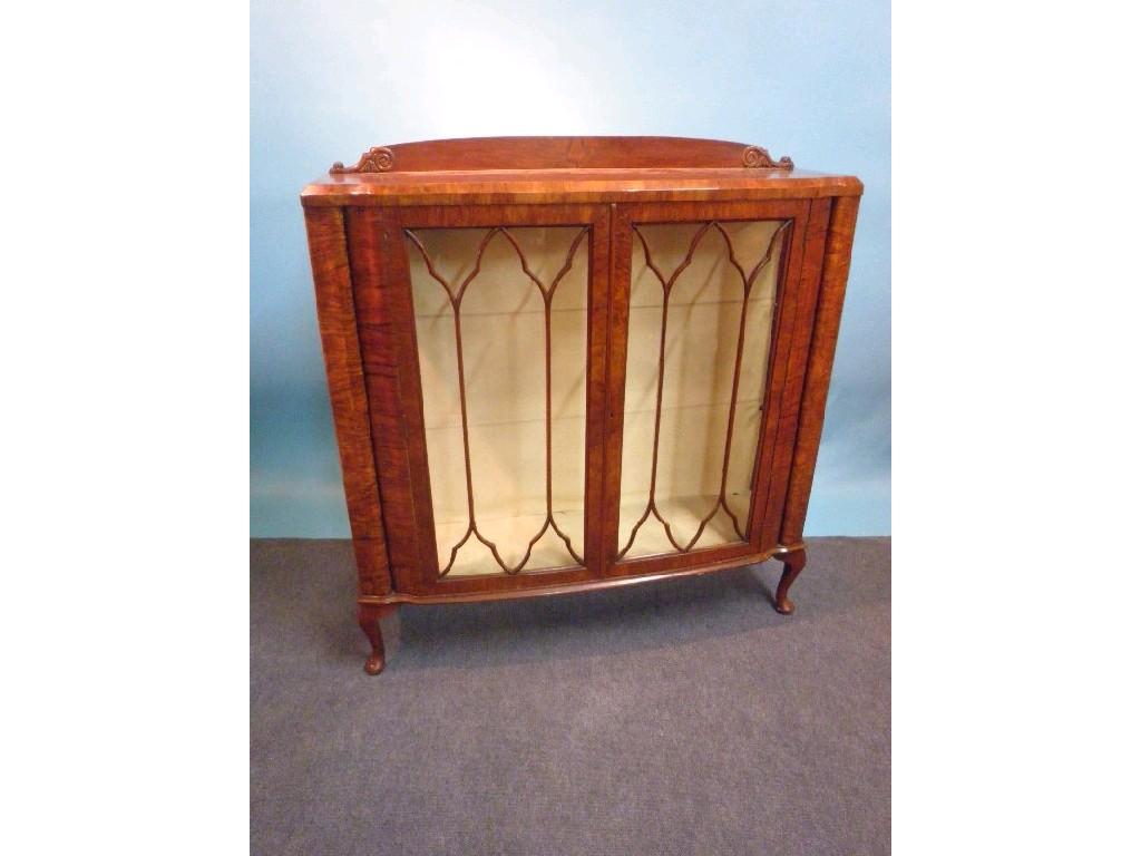 Appraisal: A walnut display cabinet in the Art Deco style with