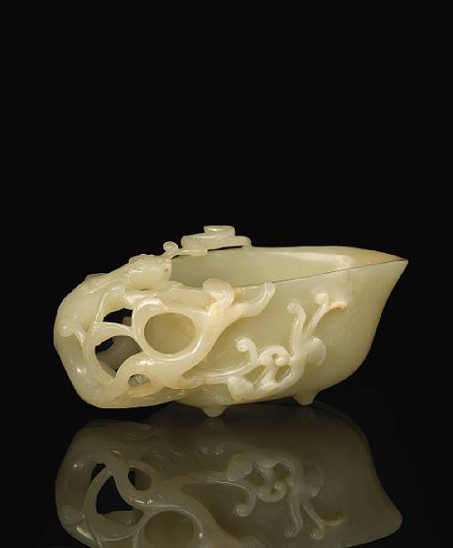 Appraisal: A white jade libation cup th th Century Raised on