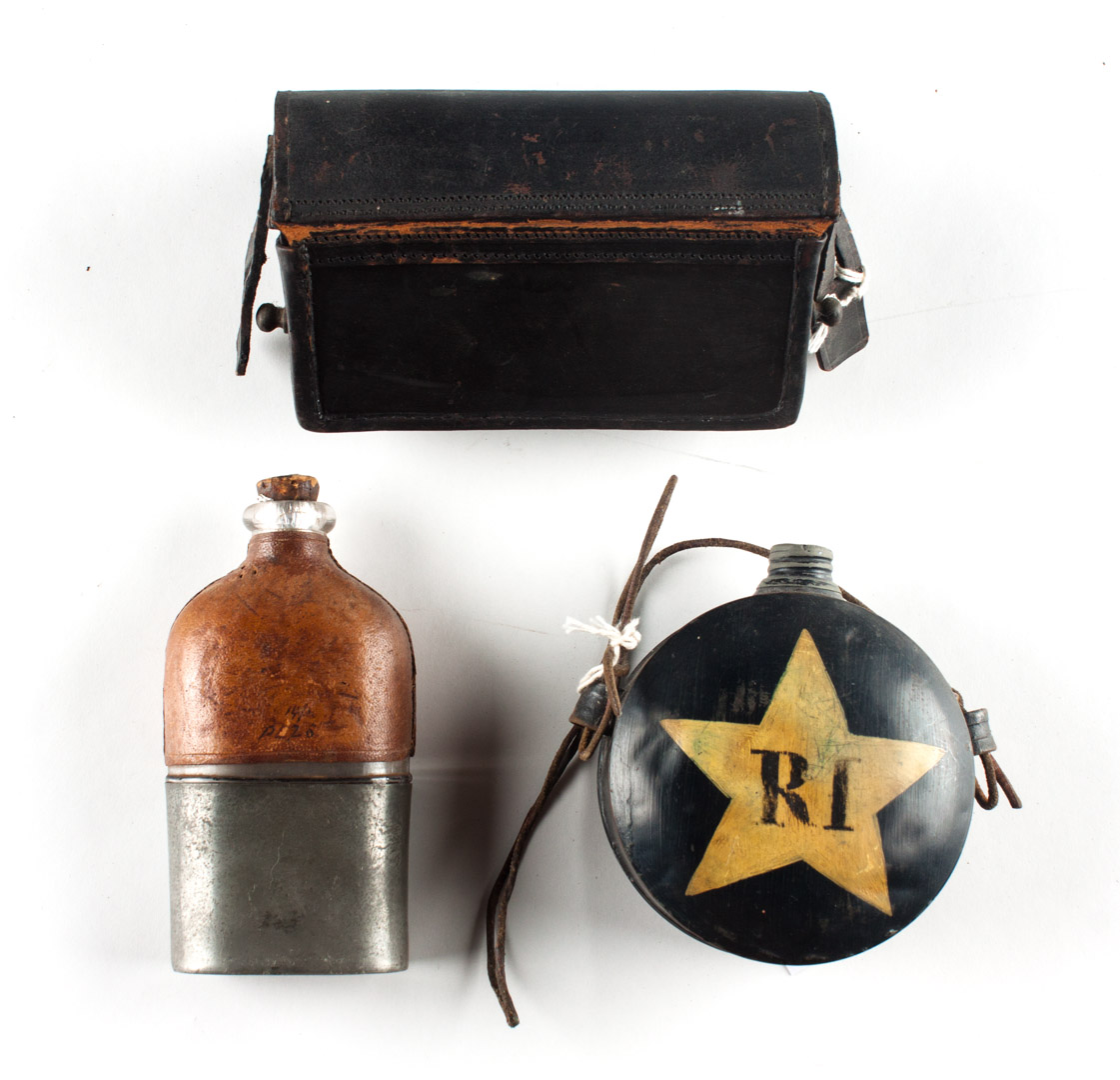 Appraisal: Leather cartridge box tole canteen and flask all late th