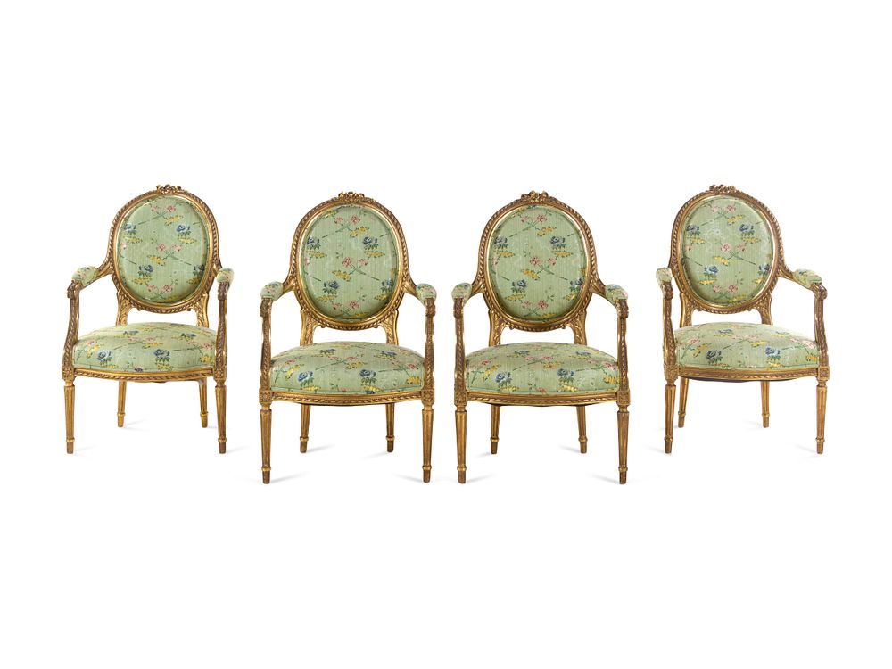 Appraisal: A Set of Four Louis XVI Style Carved Giltwood Fauteuils