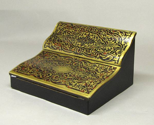 Appraisal: A Napoleon III brass and tortoiseshell traveling writing box third