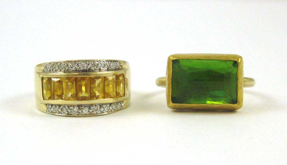 Appraisal: TWO FOURTEEN KARAT YELLOW GOLD RINGS including a size -