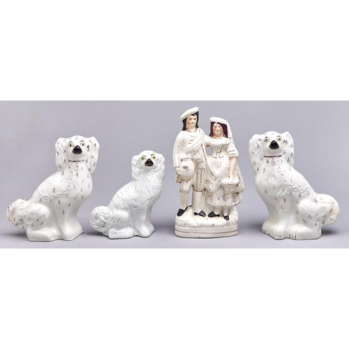 Appraisal: One and a pair of Staffordshire earthenware spaniels and a