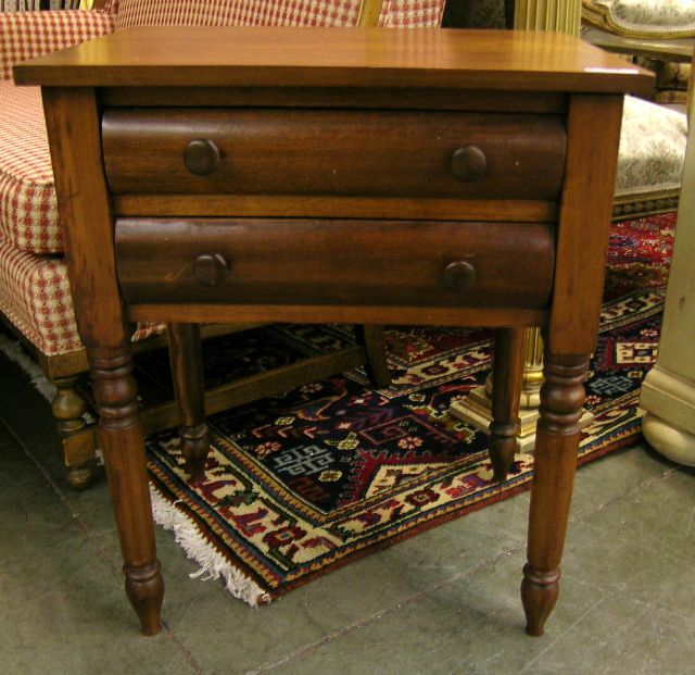 Appraisal: th Century two-drawer stand table with spindle-turned legs