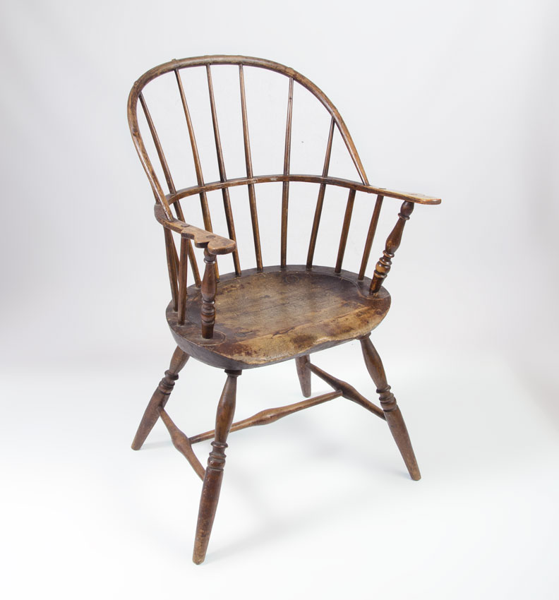 Appraisal: EARLY AMERICAN SADDLE BACK WINDSOR ARM CHAIR Bent wood saddle