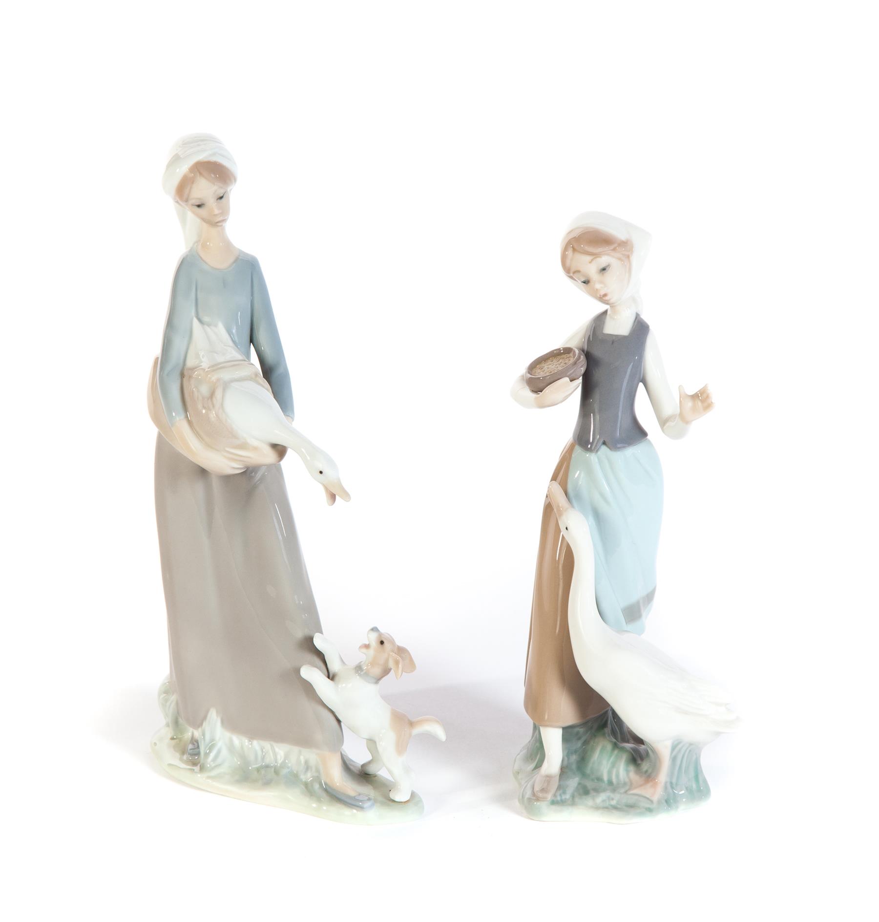 Appraisal: TWO LLADRO FIGURES OF LADIES TENDING TO DUCKS Spain th