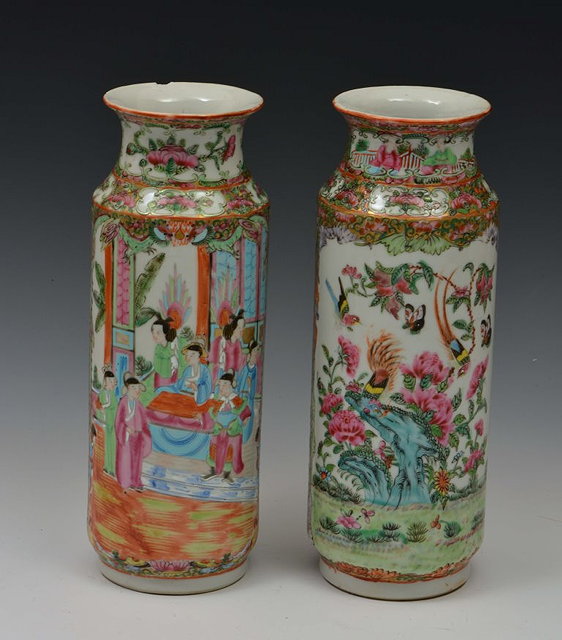 Appraisal: A PAIR OF CHINESE CANTON CYLINDRICAL VASES with panels of