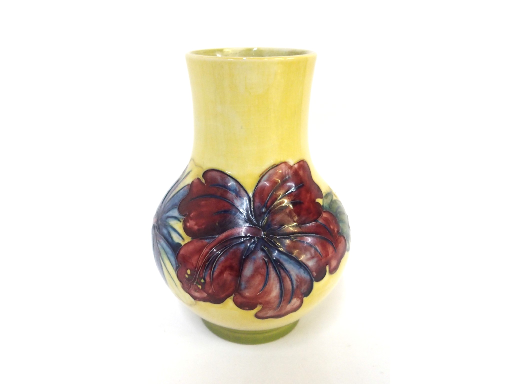 Appraisal: A Moorcroft Hibiscus vase on yellow ground