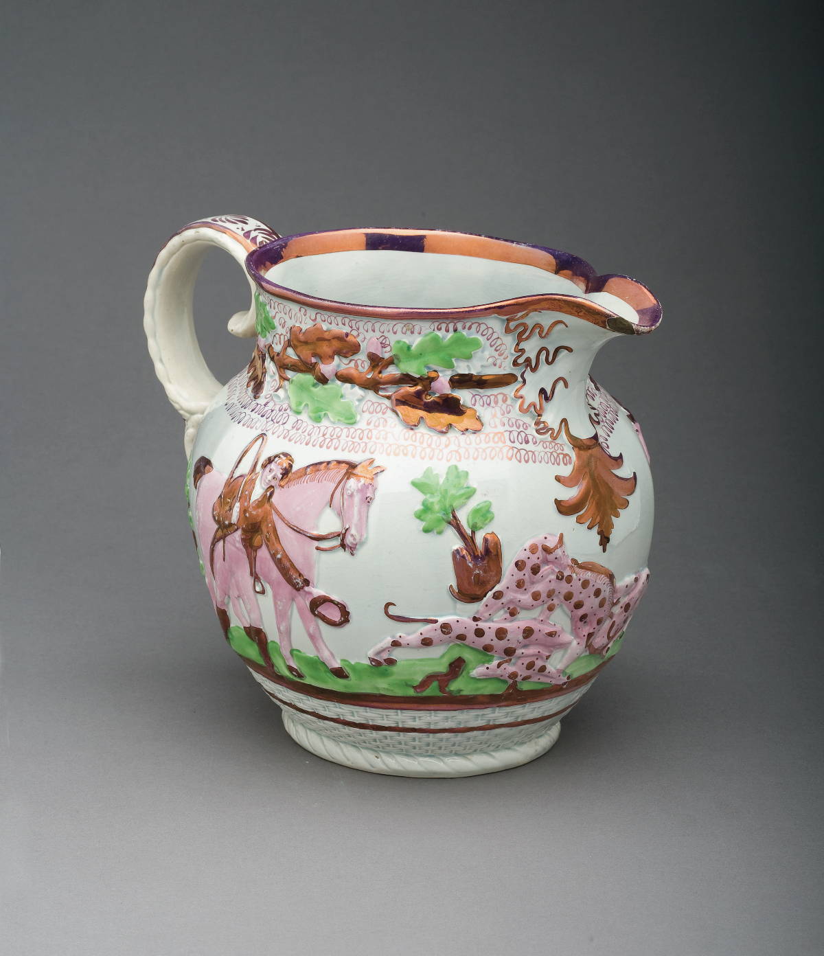 Appraisal: NEWCASTLE PEARLWARE PURPLE PINK LUSTRE AND ENAMEL-DECORATED HUNT JUG POSSIBLY