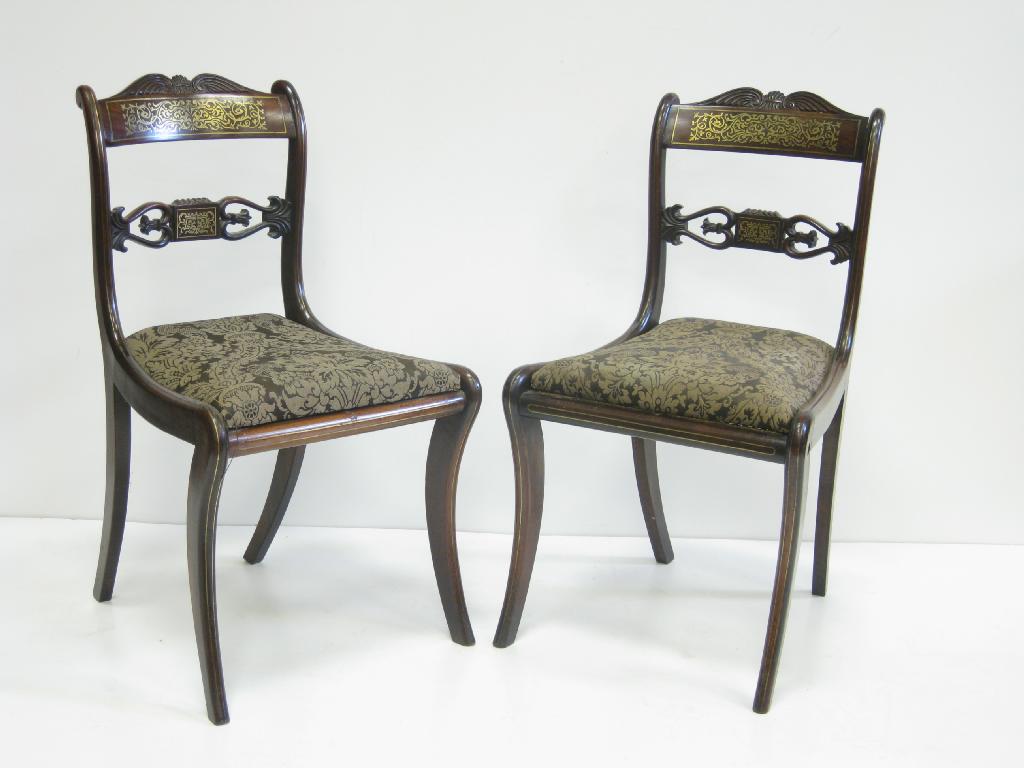 Appraisal: A Set of four Regency rosewood Dining Chairs with brass